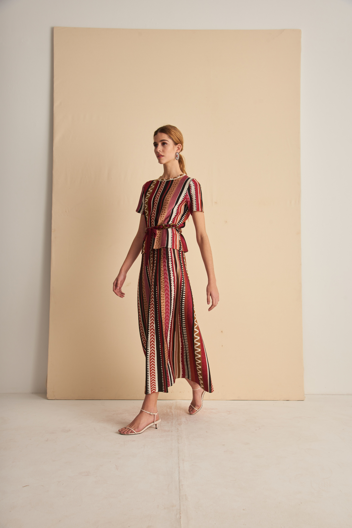 Cecilia blouse with striped and zigzag pattern by Cecilia Prado, angled view on a model - espace cannelle
