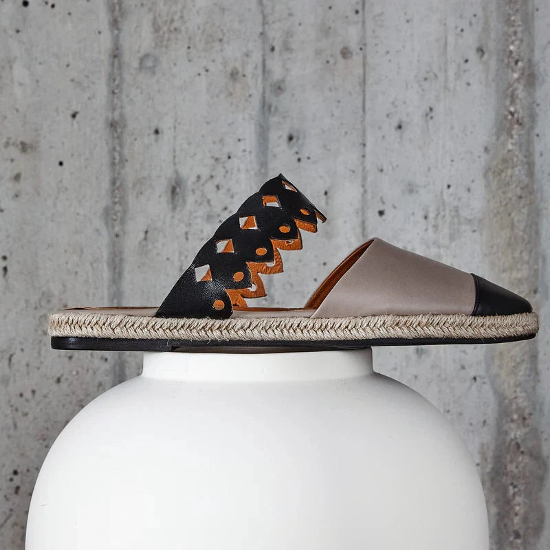 Beige and black Kendra espadrilles by Di Gaia, side view with fish-shaped cutouts and a braided sole - espace cannelle
