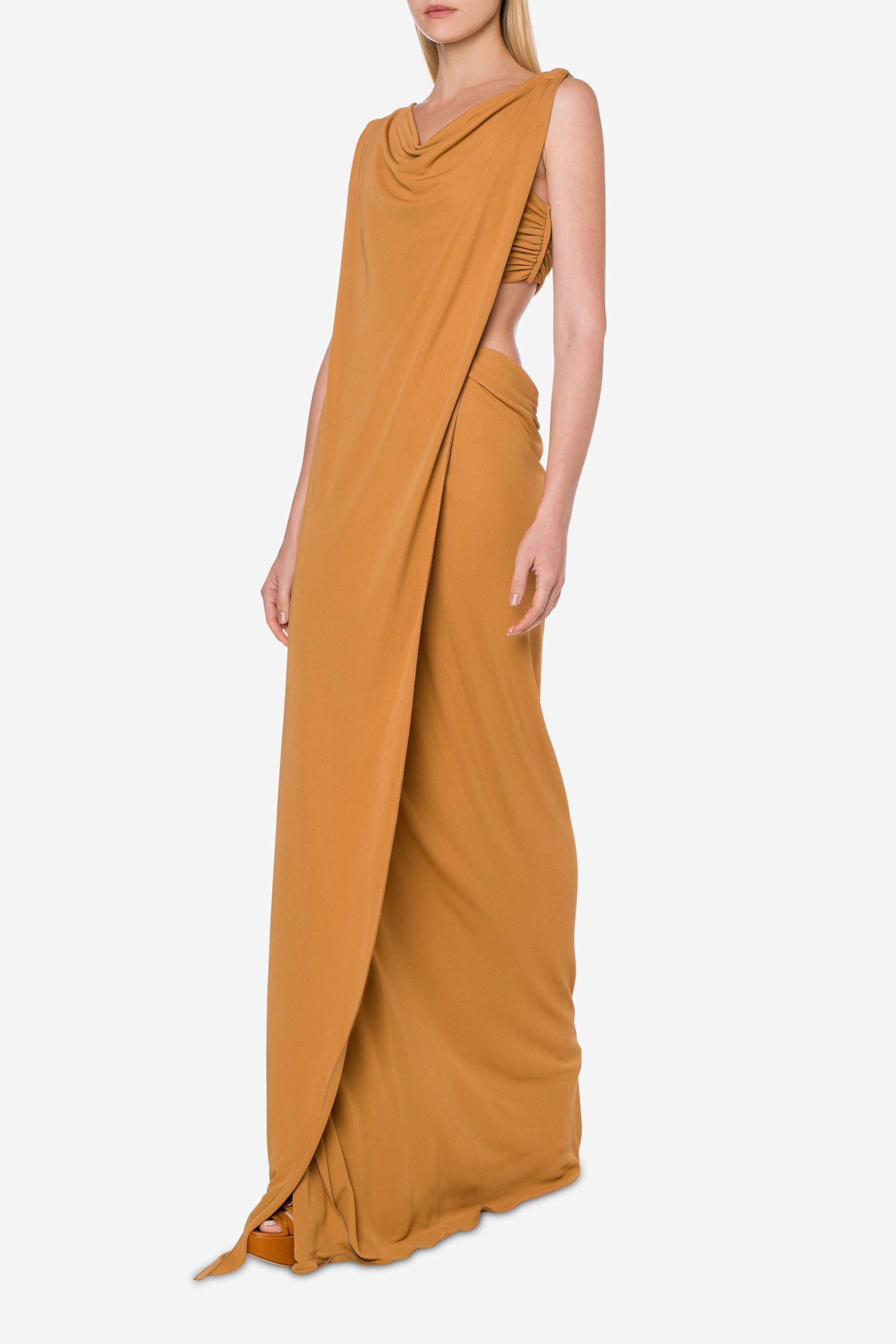 Eco-Sustainable Dress by Alberta Ferretti, 100% Viscose, Colour: Ocher, Features a drape neckline, side zippered corset and long hem. SS23 Collection, New Arrivals at Espace Cannelle