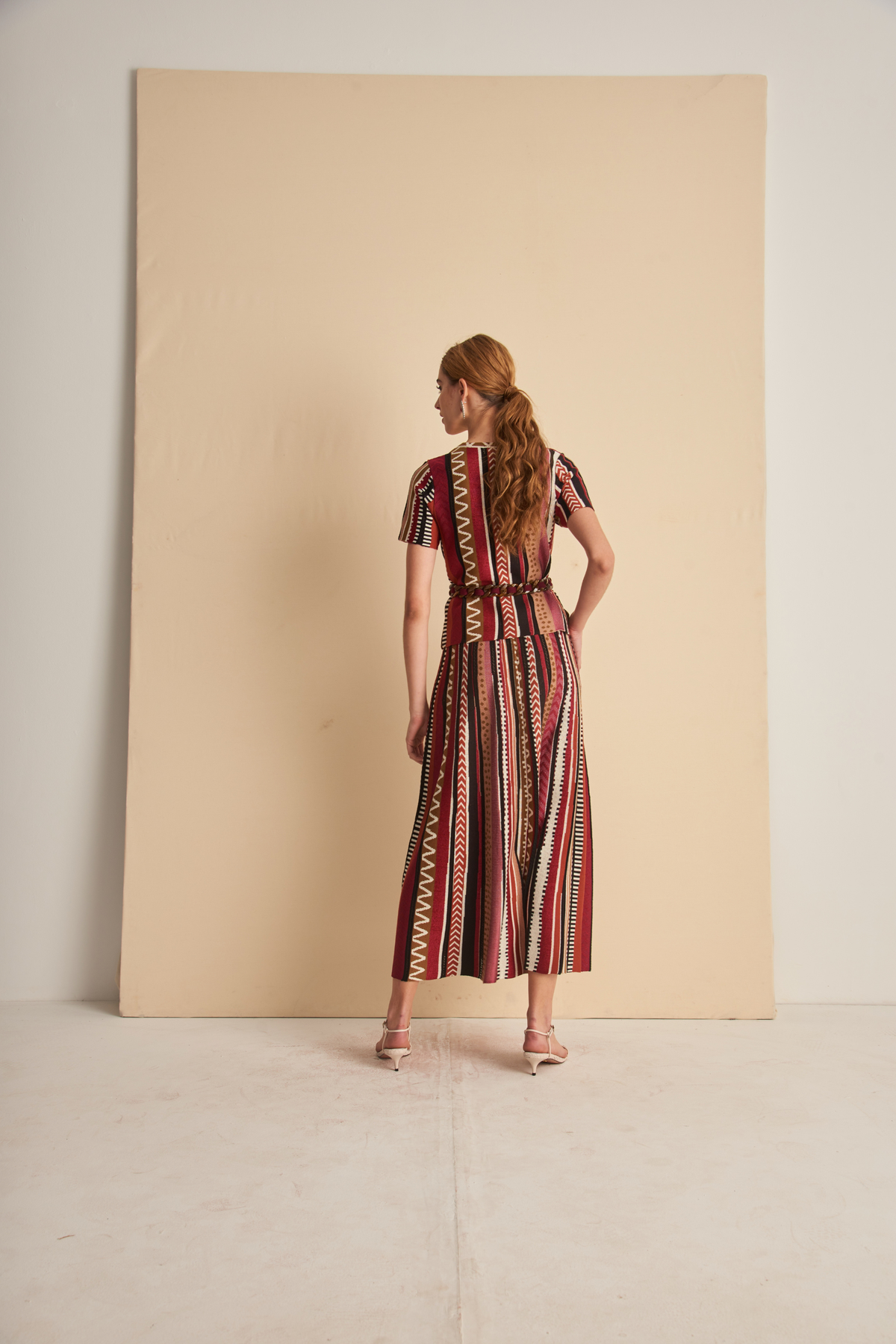 Cecilia blouse with striped and zigzag pattern by Cecilia Prado, rear view on a model