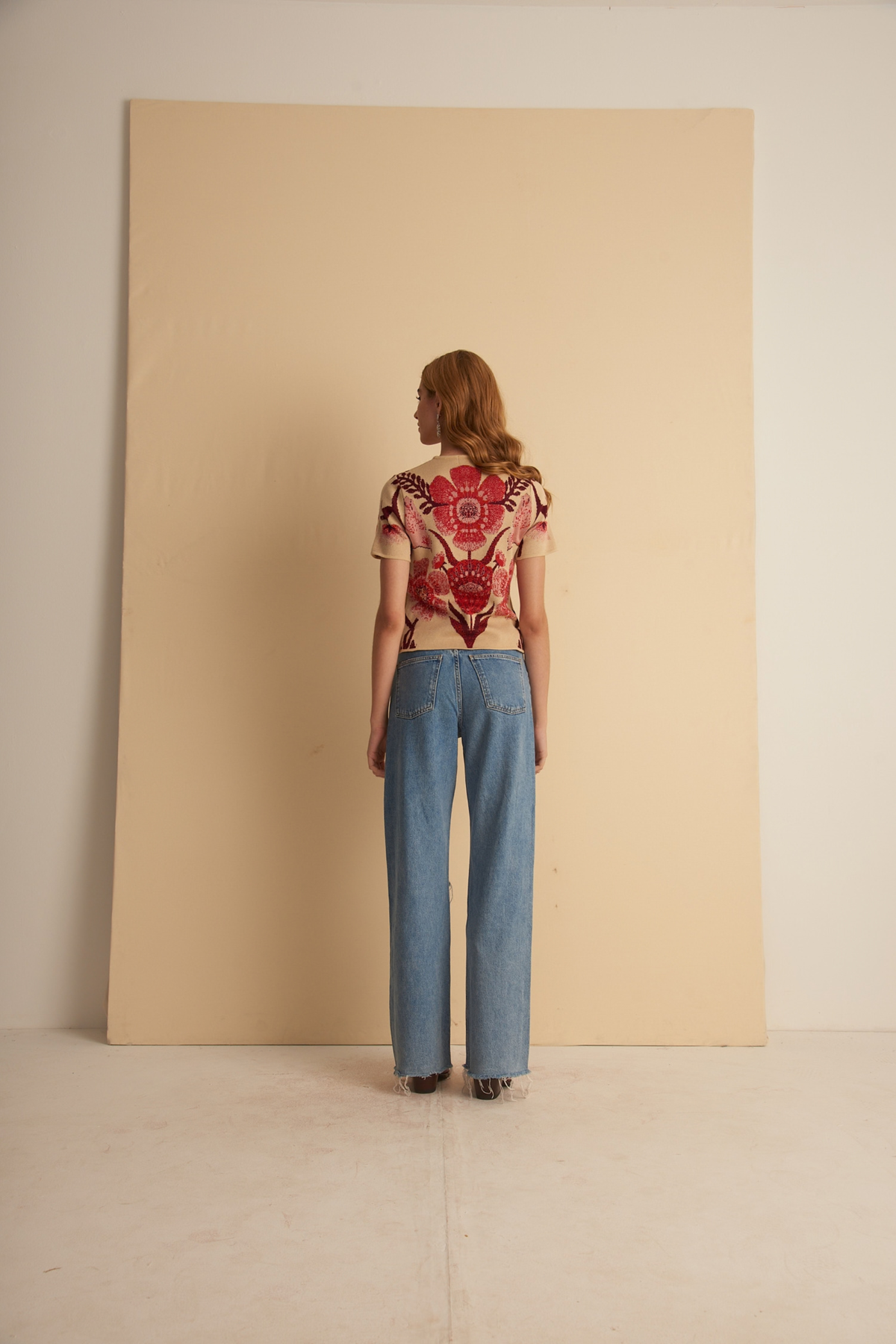 Nina top with floral pattern by Cecilia Prado, rear view on a model